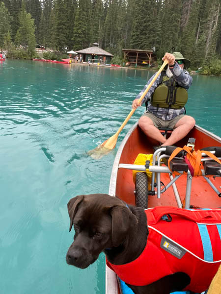 Sadie in a canoe on a glacial lake